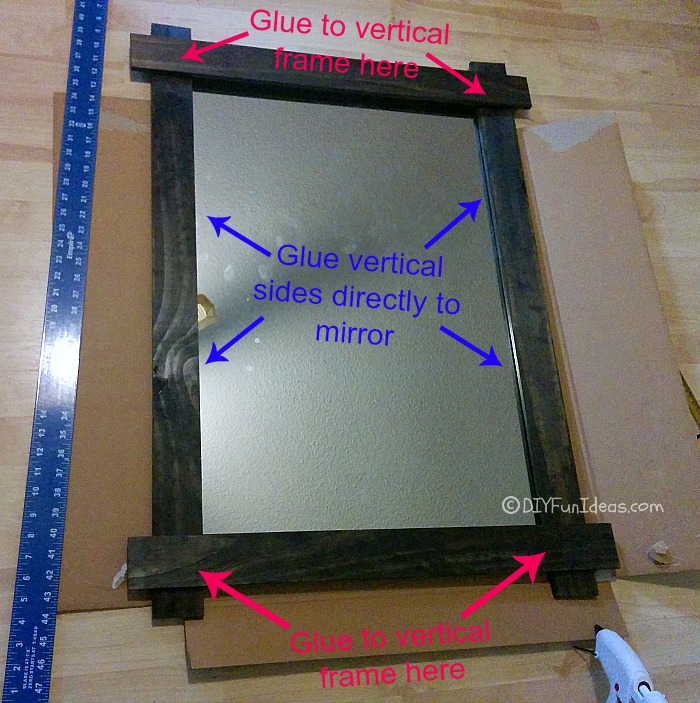 MUST SAVE THIS MIRROR UPDATE!! So easy and inexpensive to customize a mirror for a cool rustic look. Just need some slabs of wood and glue. Really it's that easy!